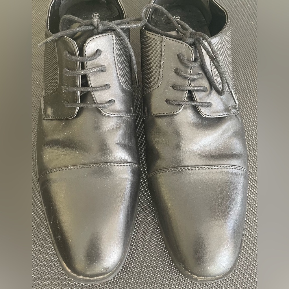 Young men’s black dress shoes
